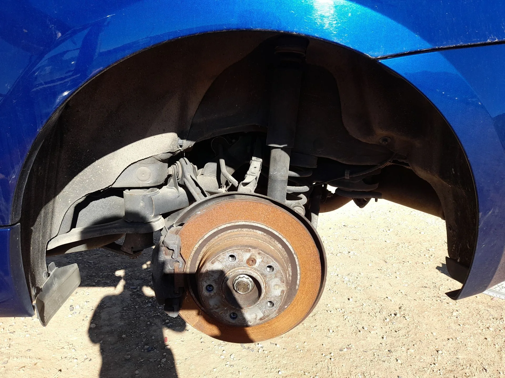 Plastico Pase Rueda Tras. Izq. para Bmw 1 (E81)