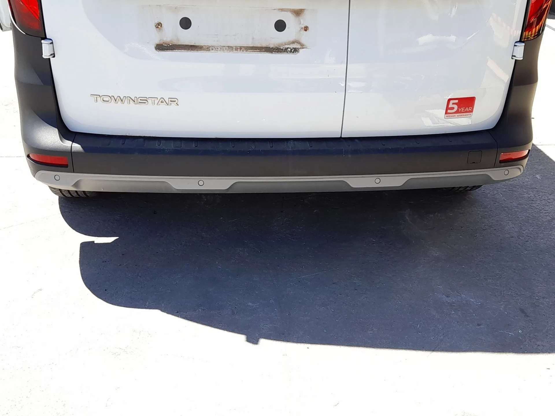 Paragolpes Trasero para Nissan Townstar Furgoneta/Monovolumen (Xfk)