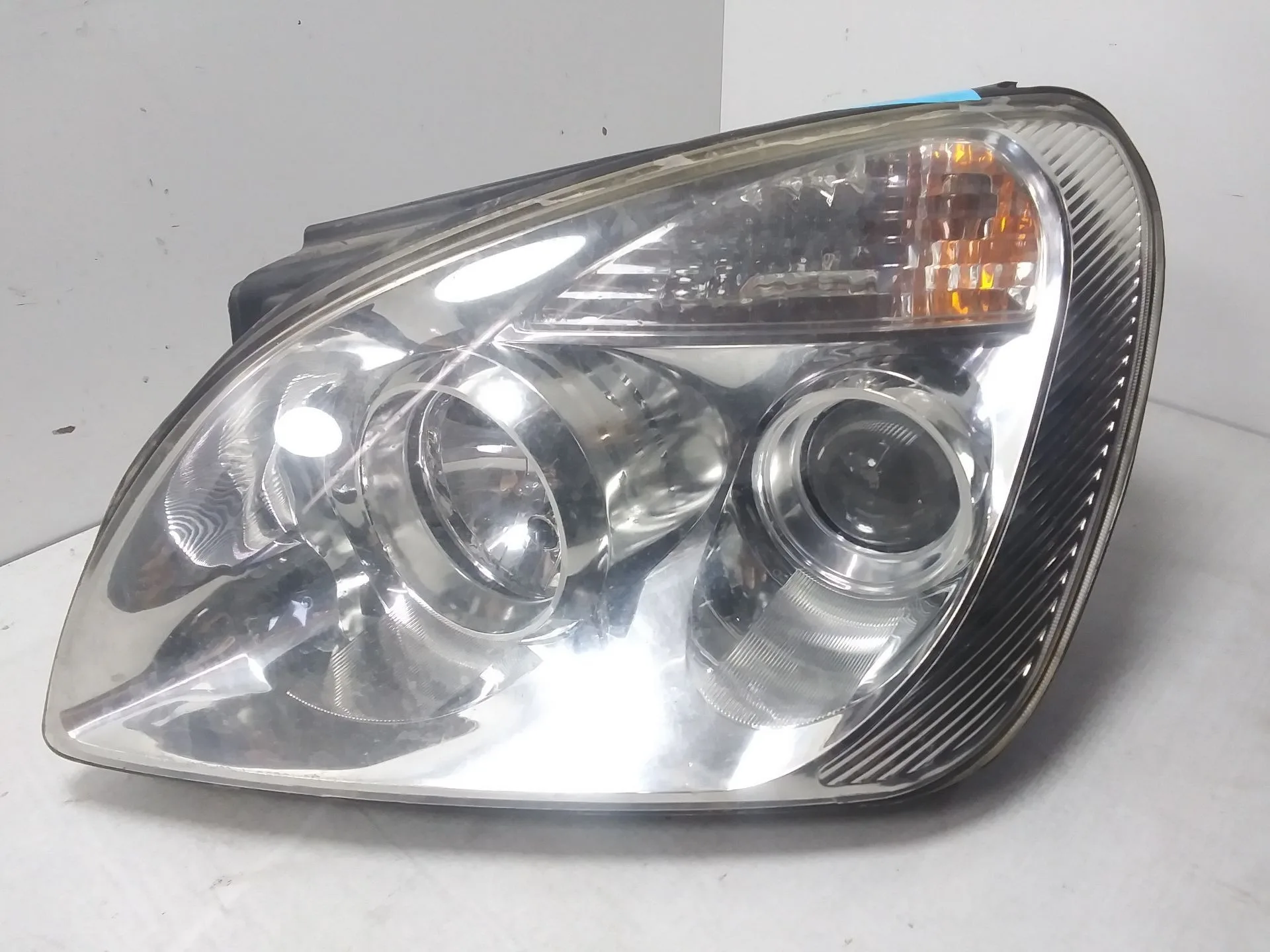 Faro Izquierdo para Kia Carens (Un)