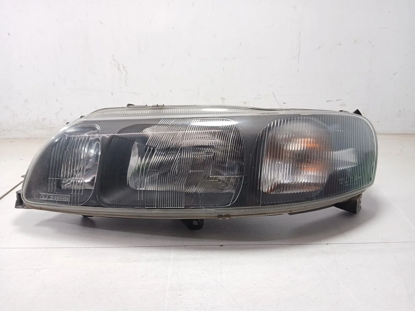 Faro Izquierdo para Volvo S60 I (384)