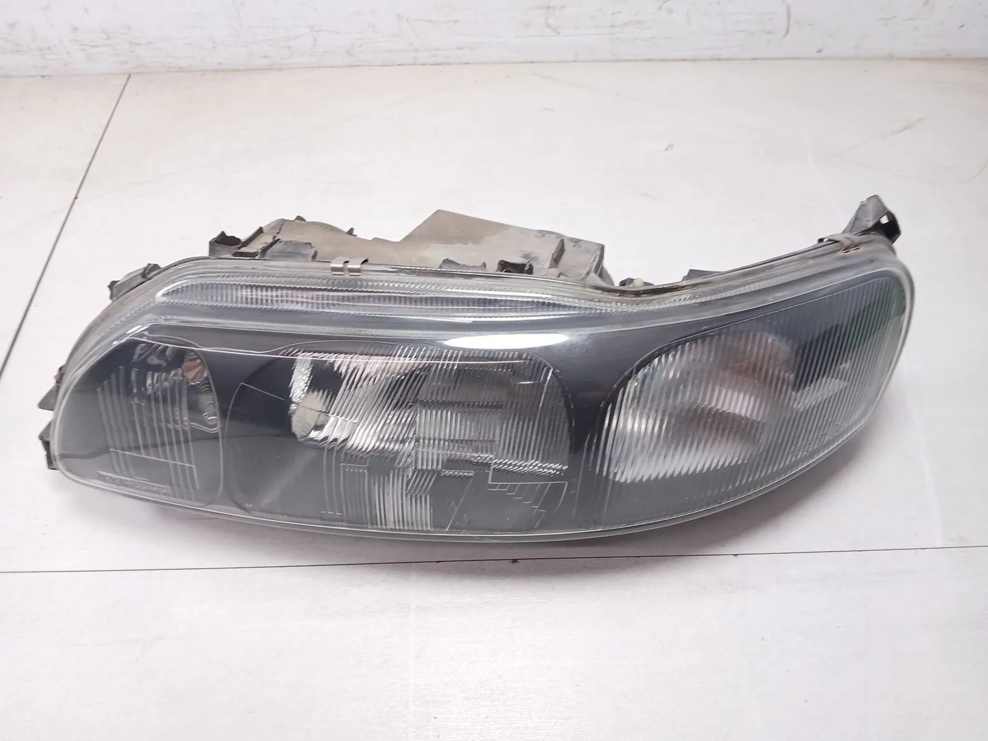 Faro Izquierdo para Volvo S60 I (384)