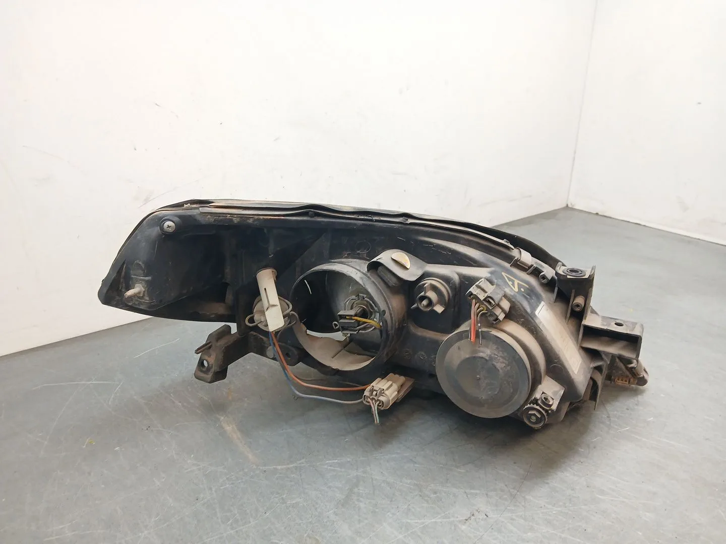 Faro Izquierdo para Nissan Primera Hatchback (P12)