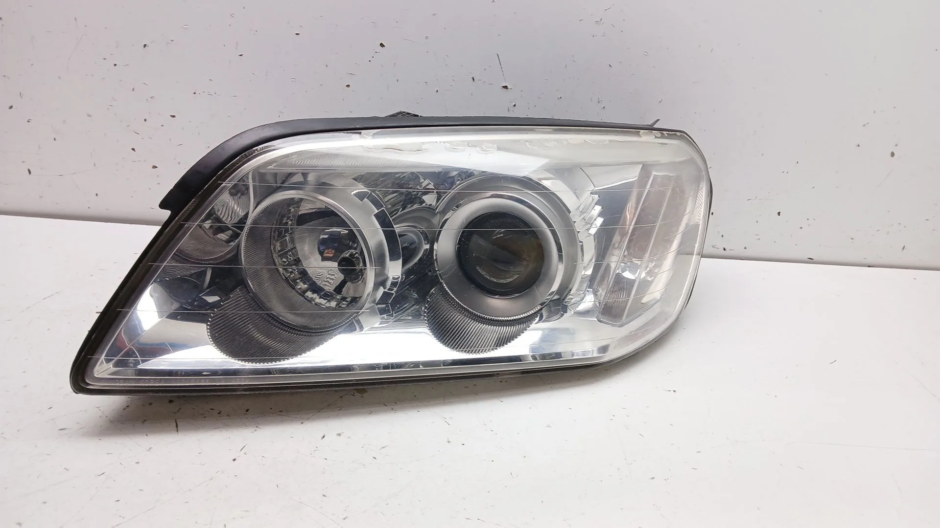 Faro Izquierdo para Chevrolet Captiva (C100, C140)