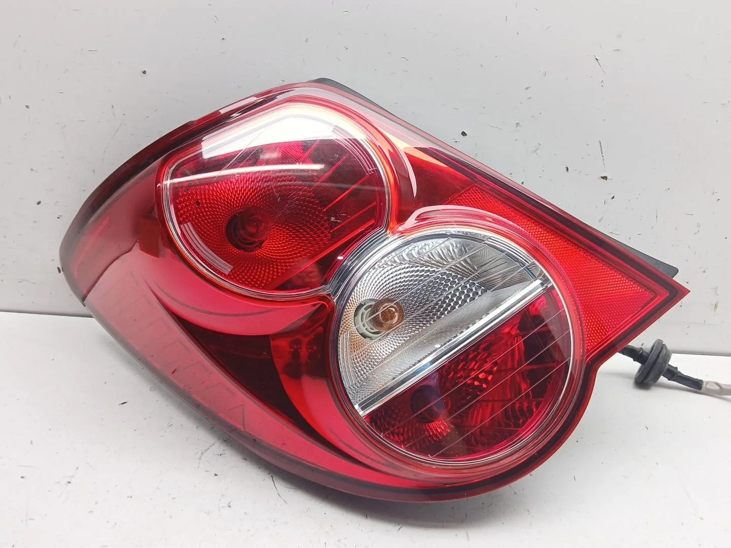 Piloto Trasero Izquierdo para Chevrolet Aveo Sedan (T300)