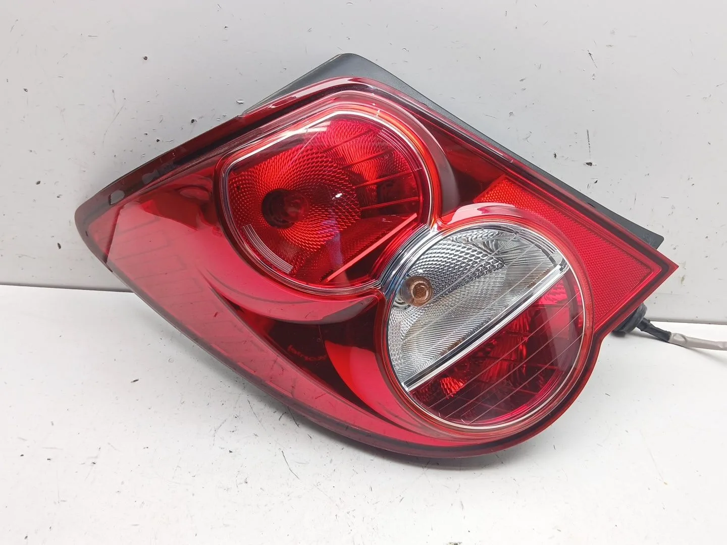 Piloto Trasero Izquierdo para Chevrolet Aveo Sedan (T300)