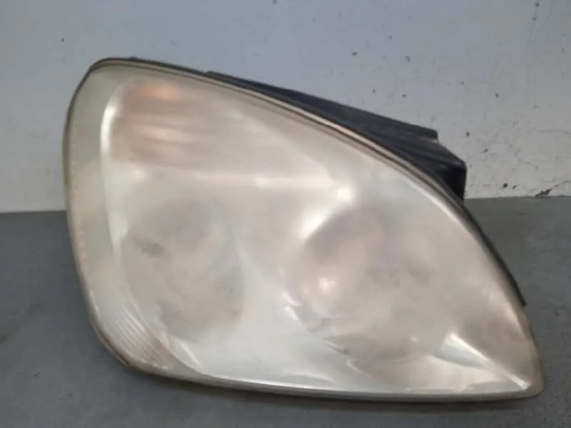 Faro Izquierdo para Kia Carens (Un)
