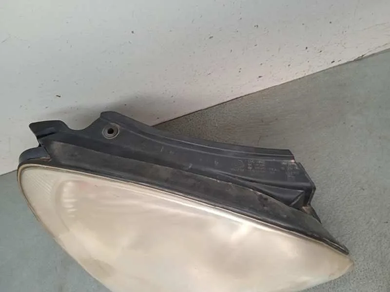 Faro Izquierdo para Kia Carens (Un)