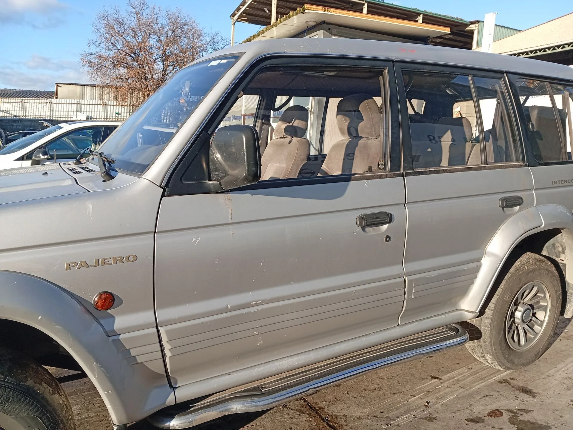 Puerta Delantera Izquierda para Mitsubishi Montero Canvas Top (V2_C, V4_C)