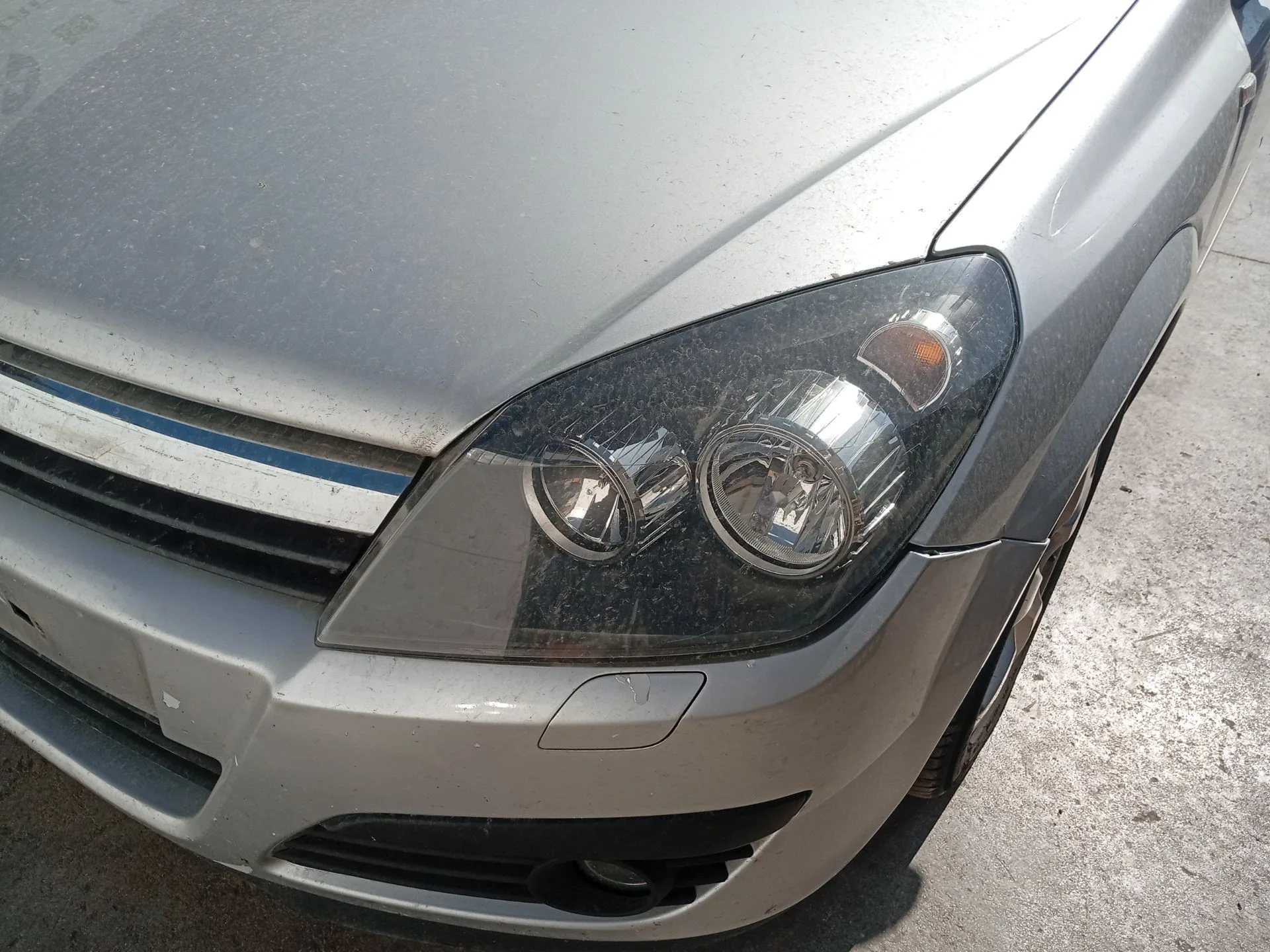 Faro Izquierdo para Opel Astra H (A04)