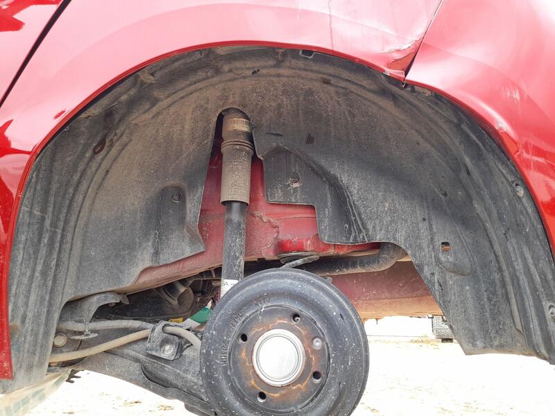Plastico Pase Rueda Tras. Izq. para Opel Corsa F (P2Jo)
