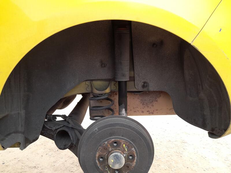Plastico Pase Rueda Tras. Izq. para Opel Corsa E (X15)