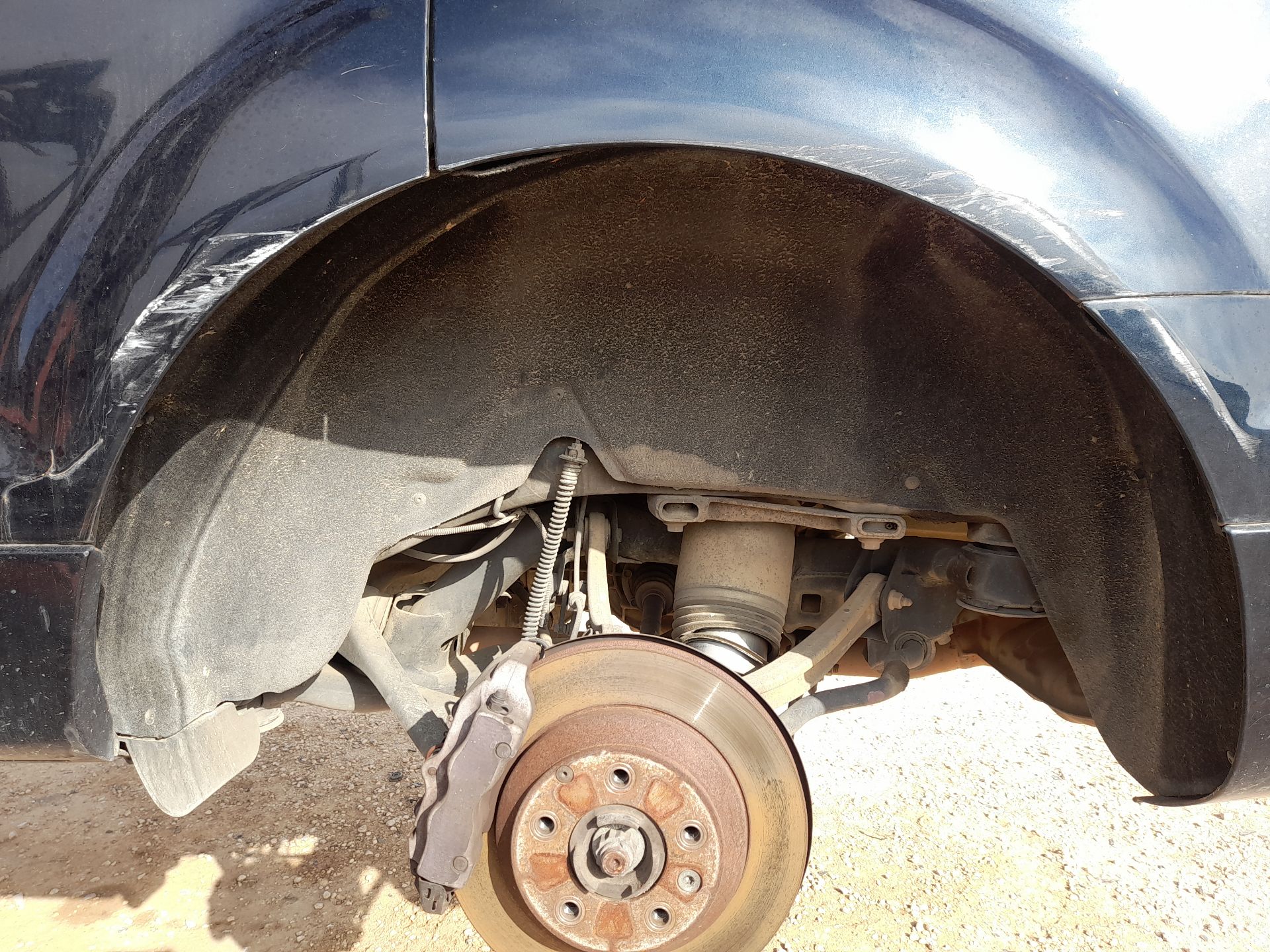 Plastico Pase Rueda Tras. Izq. para Audi Q7 (4Lb)